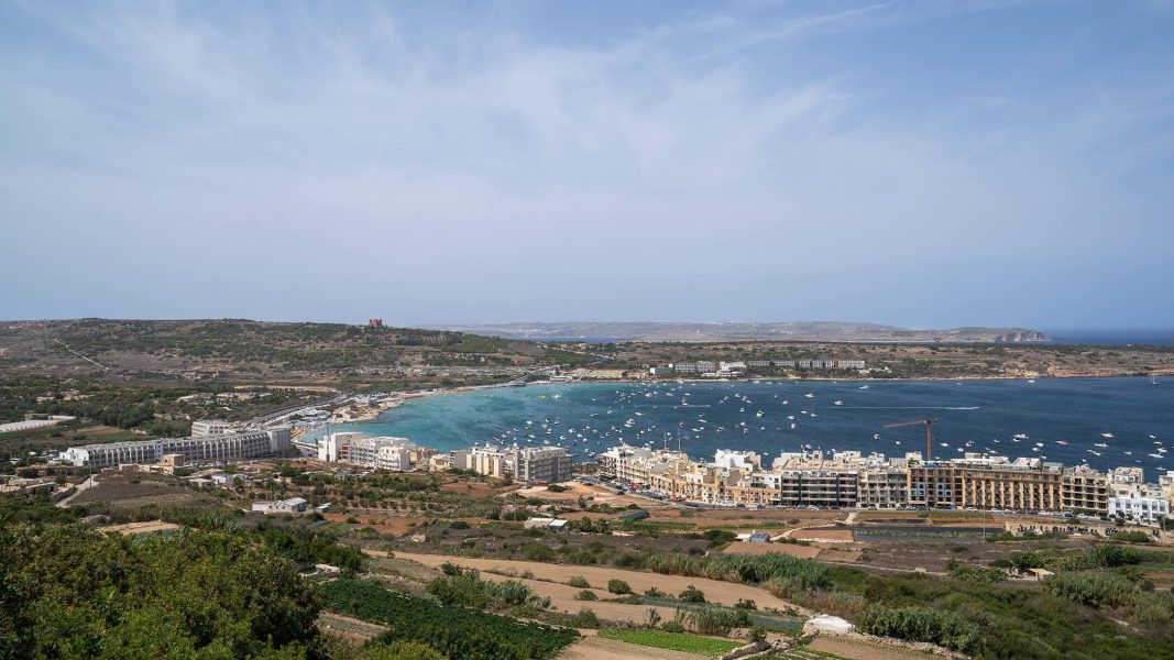 a city next to a body of water