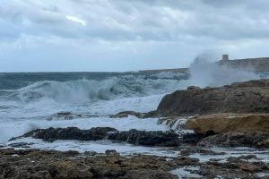 Bahar ic Caghaq shoreline on a colder, moody weather day with waves.
