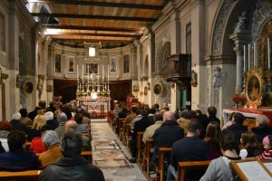 Valletta's Church of Our Lady of Victory on a busy day. People seated in every pew